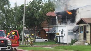 COBOURG -- Firefighters battled a blaze at a Monk Street home on July 2. The three residents escaped the home but two were sent to hospital for smoke inhalation. July 2, 2015.